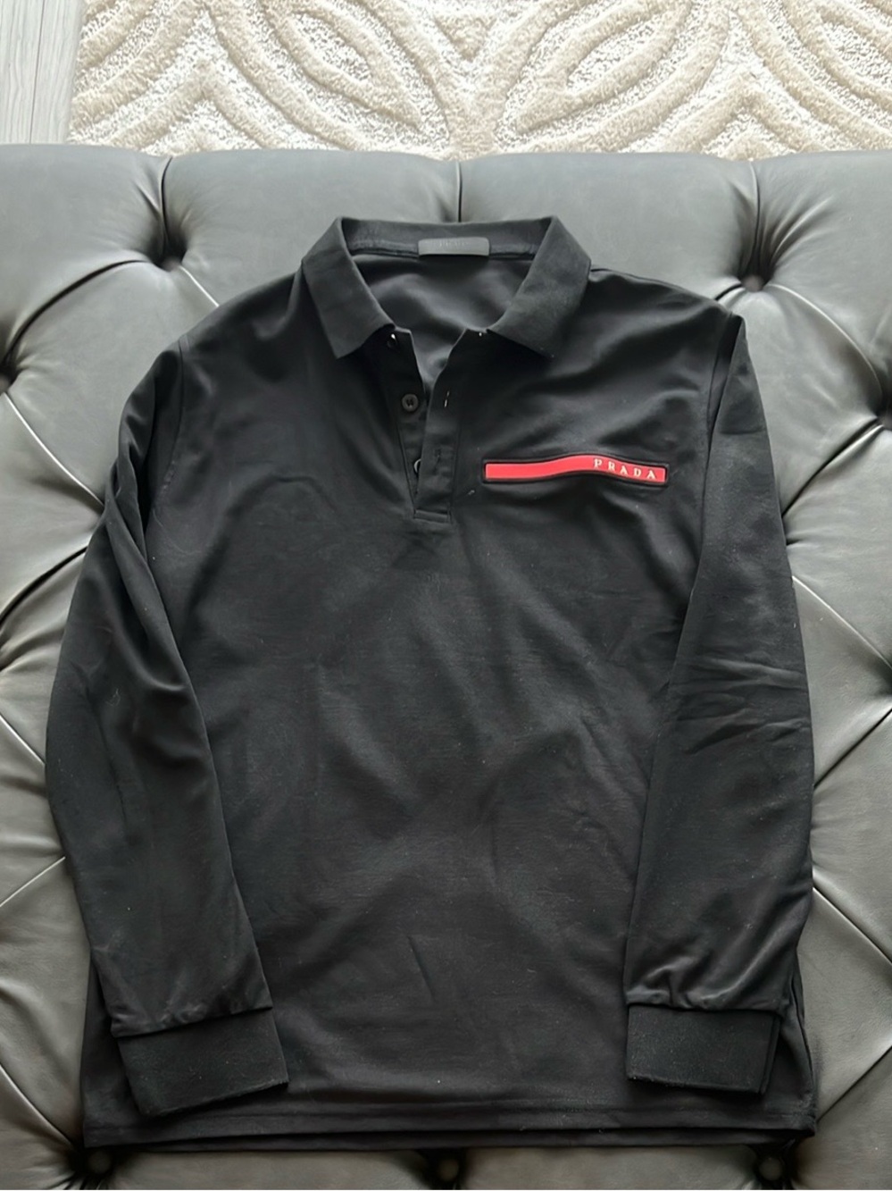 Black Long-Sleeve Polo with Red Chest Stripe